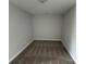 Neutral bedroom with carpeted floors and fresh paint, creating a blank canvas for personalization at 6256 Culbert St # 187, Harrisburg, NC 28075