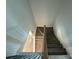 View looking down a wooden stairway at 6256 Culbert St # 187, Harrisburg, NC 28075