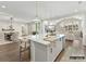 Open kitchen concept featuring a large island with seating, ideal for modern living at 6274 Chimney Bluff Rd, Lancaster, SC 29720