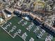 An aerial view of a waterfront community with a marina and pool at 8221 Houser St, Cornelius, NC 28031