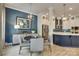 Charming dining area featuring a round table, modern chandelier, and stylish sideboard for elegant meals at 8221 Houser St, Cornelius, NC 28031
