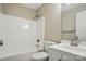 Bathroom featuring a shower-tub combo and a vanity with sink at 8309 Emily Dr, Harrisburg, NC 28075