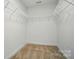 White walk-in closet with carpet and wire shelving at 8309 Emily Dr, Harrisburg, NC 28075
