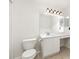 Bright bathroom with a large mirror, vanity, and modern fixtures at 9013 Trellis Pointe Blvd, Charlotte, NC 28227
