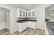 Kitchen boasting stone countertops and glass front cabinets at 9013 Trellis Pointe Blvd, Charlotte, NC 28227