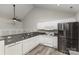 Spacious kitchen with stainless steel appliances and stone countertops at 9013 Trellis Pointe Blvd, Charlotte, NC 28227