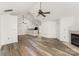 Spacious living room with vaulted ceilings, modern flooring, and a cozy fireplace at 9013 Trellis Pointe Blvd, Charlotte, NC 28227