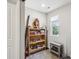 Charming, well-lit room with vintage decor and a window offering a view of lush greenery at 9115 Providence S Rd, Waxhaw, NC 28173