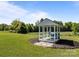 Picturesque backyard featuring a charming gazebo retreat, perfect for relaxing or reading a book at 9871 Travertine Trl, Davidson, NC 28036