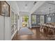 Open foyer with hardwood floors leading to a dining room and living spaces at 9871 Travertine Trl, Davidson, NC 28036