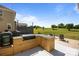 Enjoyable outdoor kitchen and entertaining area with grill, counter space, and plenty of room for gathering at 9871 Travertine Trl, Davidson, NC 28036