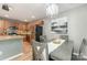 Charming dining area featuring modern lighting, wood floors, and a decorative centerpiece at 10421 Columbia Crest Ct, Charlotte, NC 28270