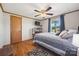 Bright bedroom features hardwood floors, a ceiling fan, and a large window with natural light at 105 Carrie Ln # 3, Cherryville, NC 28021
