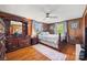 Elegant bedroom featuring hardwood floors, a ceiling fan, and bright natural light at 105 Carrie Ln # 3, Cherryville, NC 28021