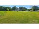 Expansive front yard with lush green lawn surrounding a charming house at 105 Carrie Ln # 3, Cherryville, NC 28021