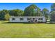 Charming single-story home with a well-maintained lawn, green shutters, and a welcoming porch at 105 Carrie Ln # 3, Cherryville, NC 28021