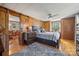 Spacious main bedroom with wood paneling, neutral walls, and an adjacent dining area at 105 Carrie Ln # 3, Cherryville, NC 28021