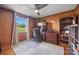 Well-lit home office featuring wood paneling, a built-in desk, and a large window at 105 Carrie Ln # 3, Cherryville, NC 28021