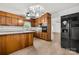 Well-equipped kitchen featuring ample counter space, cabinetry, and stainless steel appliances at 12117 Idlewild Rd, Matthews, NC 28105