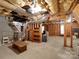 Spacious unfinished basement with utilities, exposed wood framing, and potential for customization at 12317 Panthersville Dr, Charlotte, NC 28269
