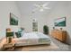Serene main bedroom with ample natural light, stylish decor, and comfortable furnishings at 12317 Panthersville Dr, Charlotte, NC 28269