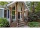 Inviting entryway with decorative pillars and updated lighting fixtures at 1407 Jodhpur Ct, Charlotte, NC 28212