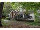 Inviting home showcasing a lush yard and well-maintained exterior at 1407 Jodhpur Ct, Charlotte, NC 28212