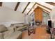 Inviting living room featuring a cozy fireplace and comfortable seating arrangements at 1407 Jodhpur Ct, Charlotte, NC 28212
