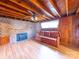 Living room features laminate floors, a brick fireplace, and a comfortable sofa, perfect for relaxation at 1468 Hilltop St, Albemarle, NC 28001