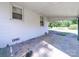 Covered patio featuring a brick floor, with ample space for outdoor seating and entertaining at 1468 Hilltop St, Albemarle, NC 28001