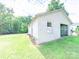 Spacious detached garage with a grass lawn providing ample parking and storage space at 1470 Hilltop St, Albemarle, NC 28001