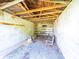 Shed interior with cinder block walls and wooden frame ceiling at 1470 Hilltop St, Albemarle, NC 28001