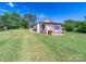 View of shed with overgrown grass at 1470 Hilltop St, Albemarle, NC 28001