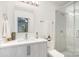 Modern bathroom with a walk-in shower, stylish vanity, and bright lighting at 1533 Briar Creek Rd # A, Charlotte, NC 28205