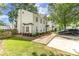 Exterior view of a home showcasing the well-maintained lawn and neat landscaping at 1533 Briar Creek Rd # A, Charlotte, NC 28205