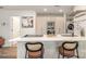 Contemporary kitchen with sleek countertops, modern appliances, and breakfast bar at 1533 Briar Creek Rd # A, Charlotte, NC 28205
