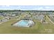 Aerial view showcasing the community pool, surrounded by well-maintained green spaces and residential homes at 1601 Calder Dr, Indian Trail, NC 28079