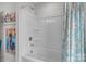 Bathroom featuring a shower/tub combo and a floral shower curtain at 1601 Calder Dr, Indian Trail, NC 28079