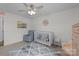 Charming Bedroom featuring a white crib, cozy rocker, and a view of the neighborhood at 1601 Calder Dr, Indian Trail, NC 28079