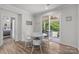 Bright dining area with patio access and seating, perfect for enjoying indoor-outdoor meals at 1601 Calder Dr, Indian Trail, NC 28079