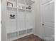 Organized mudroom with built-in storage cubbies, hooks, and bench seating for convenient entryway storage at 1601 Calder Dr, Indian Trail, NC 28079