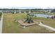 Aerial view of a neighborhood playground and pool, with surrounding homes and green spaces at 1601 Calder Dr, Indian Trail, NC 28079