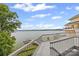 Waterfront view from a spacious balcony, overlooking docks and tranquil waters at 16108 Woolwine Rd, Charlotte, NC 28278