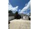 Charming home featuring an attached two car garage, with a well-manicured front yard and inviting entrance at 16108 Woolwine Rd, Charlotte, NC 28278