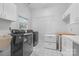 Spacious laundry room features modern appliances and ample storage space at 16108 Woolwine Rd, Charlotte, NC 28278