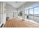 Covered porch with wooden floor and large windows at 16108 Woolwine Rd, Charlotte, NC 28278