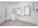 A large walk-in closet features custom shelving and ample storage space at 16108 Woolwine Rd, Charlotte, NC 28278