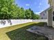 Fenced backyard with green grass perfect for outdoor activities and relaxation at 17204 Caldwell Track Dr, Huntersville, NC 28078