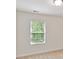 Bright bedroom with plush carpet, and large window letting in natural light at 17204 Caldwell Track Dr, Huntersville, NC 28078
