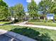Well-manicured lawn and landscaping compliment the neighborhood community clubhouse at 17204 Caldwell Track Dr, Huntersville, NC 28078